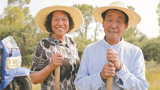 “時代楷?！睆堖B?。簶s譽的背后，離不開妻子的默默支持